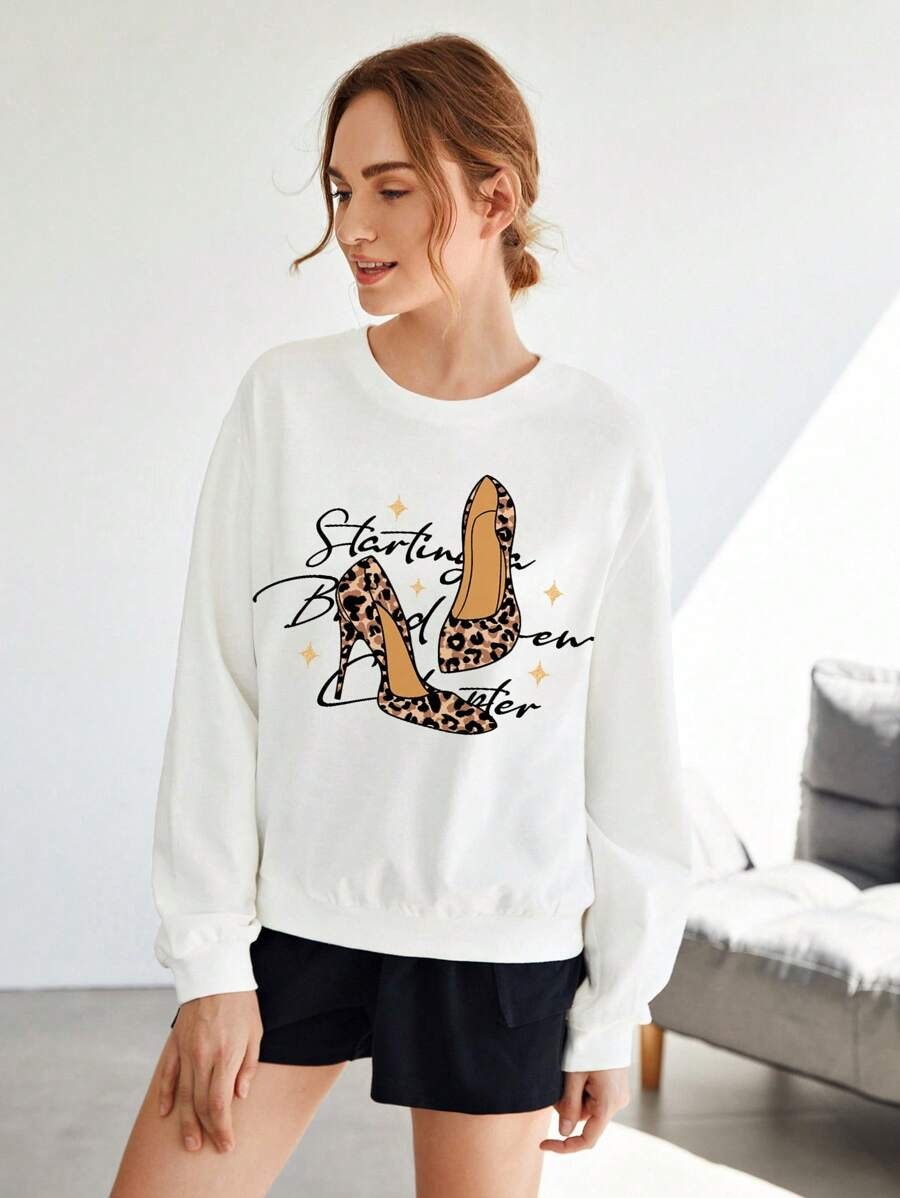 SHEIN Essnce Sudadera informal de mujer con ajuste holgado con estampado de dibujos animados, adecuada para otoño/invierno