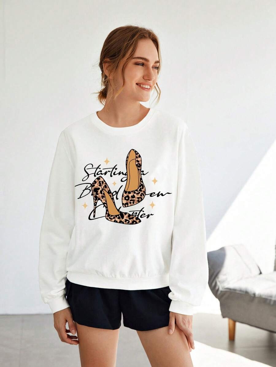 SHEIN Essnce Sudadera informal de mujer con ajuste holgado con estampado de dibujos animados, adecuada para otoño/invierno