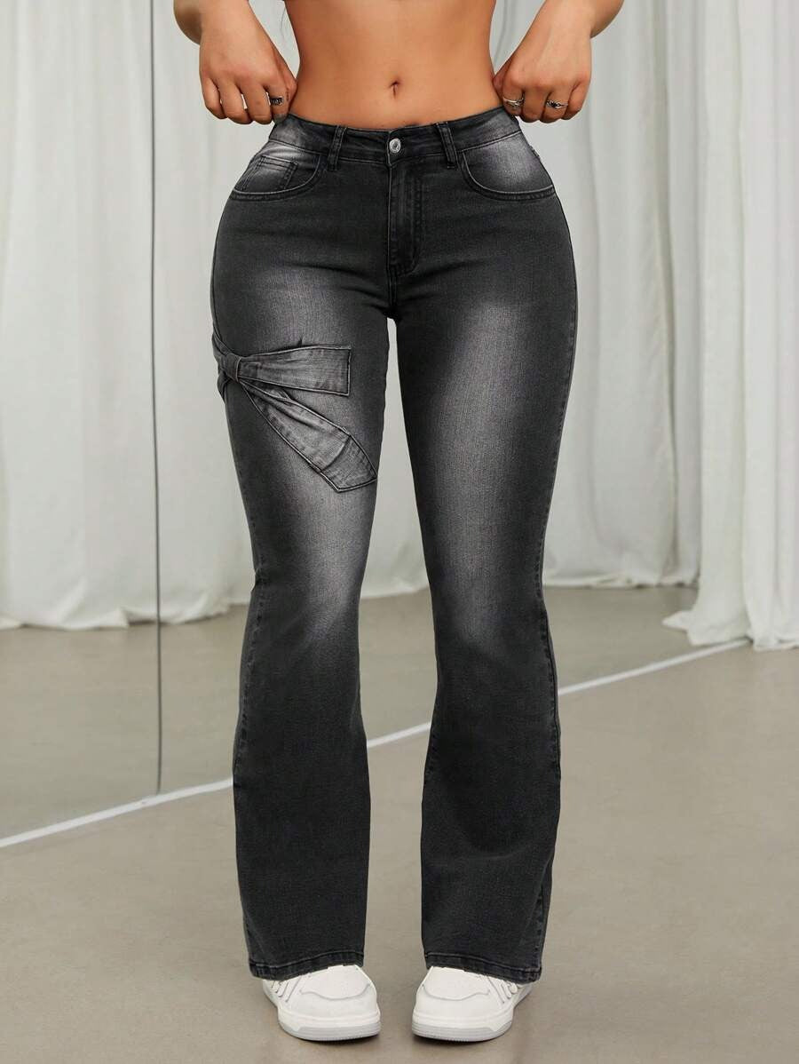 SHEIN ICON Vaqueros Acampanados Con Lavado Con Agua Y Nudo De Mariposa De Cintura Baja Para Mujer