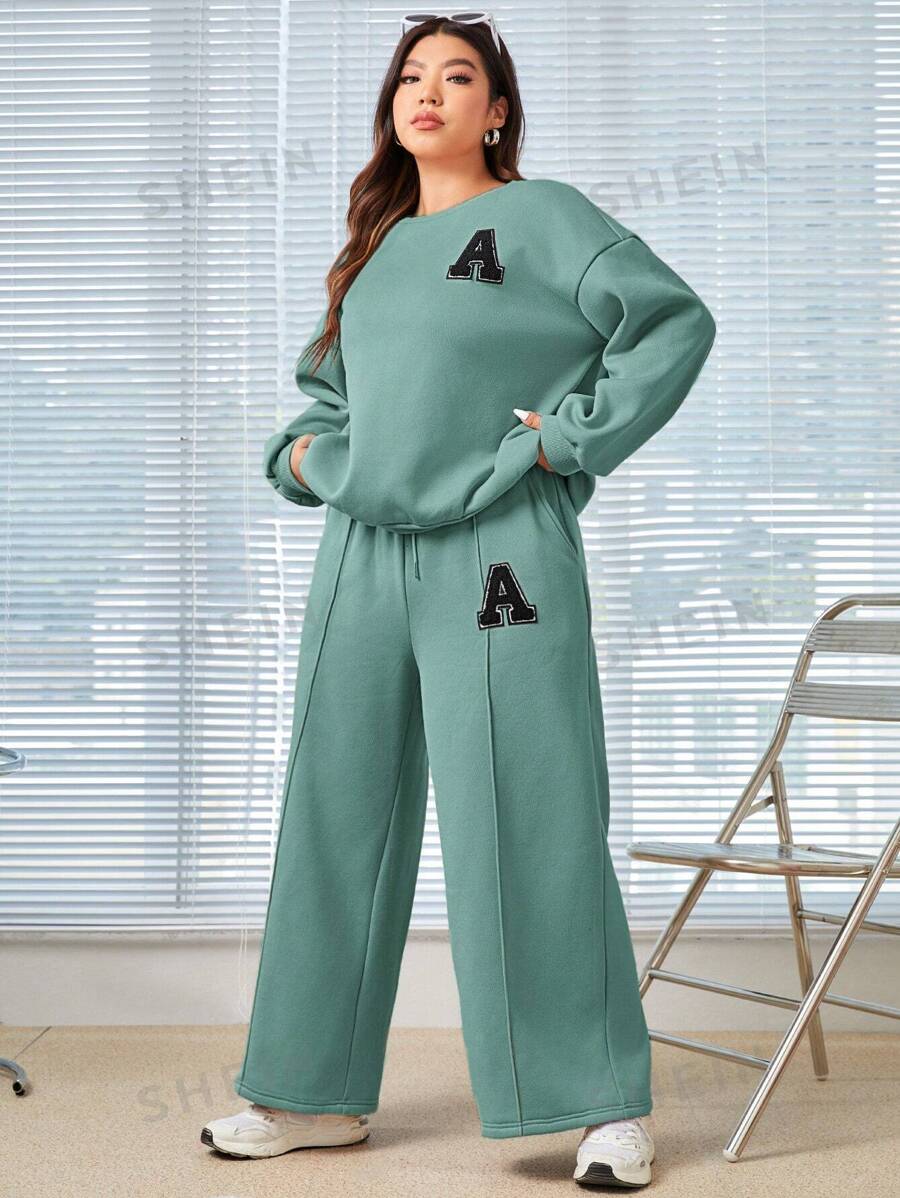 SHEIN EZwear Conjunto De Sudadera De Cuello Redondo Y Pantalones Con Cordón A La Cintura Para Mujer De Talla Grande