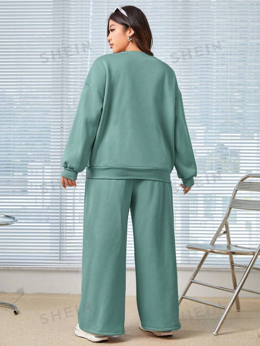 SHEIN EZwear Conjunto De Sudadera De Cuello Redondo Y Pantalones Con Cordón A La Cintura Para Mujer De Talla Grande