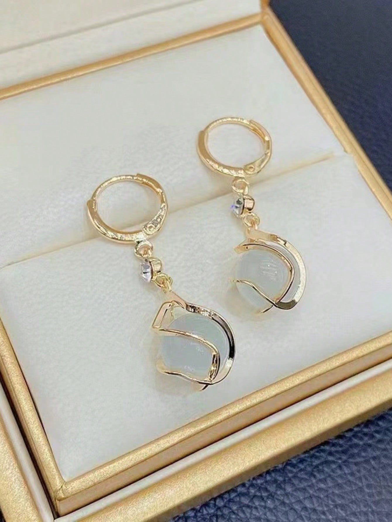 1 par de pendientes de moda clásicos europeos y americanos, pendientes de piedra de ojo de gato, pendientes largos con colgante de gota de diseño dulce