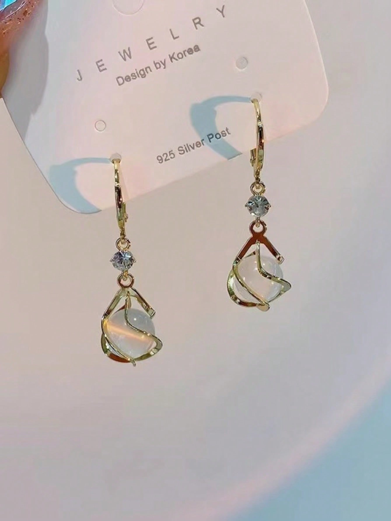 1 par de pendientes de moda clásicos europeos y americanos, pendientes de piedra de ojo de gato, pendientes largos con colgante de gota de diseño dulce