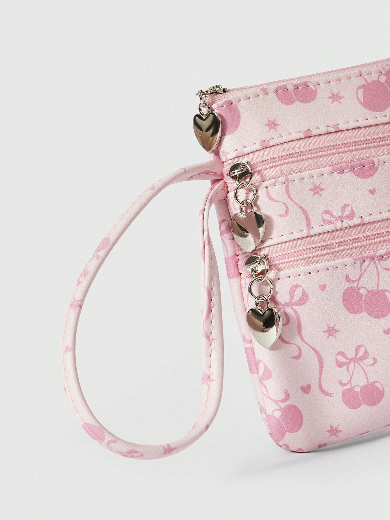 ROMWE Kawaii Bolsa con cremallera de gran capacidad con estampado de lazos de dibujos animados en toda la superficie
