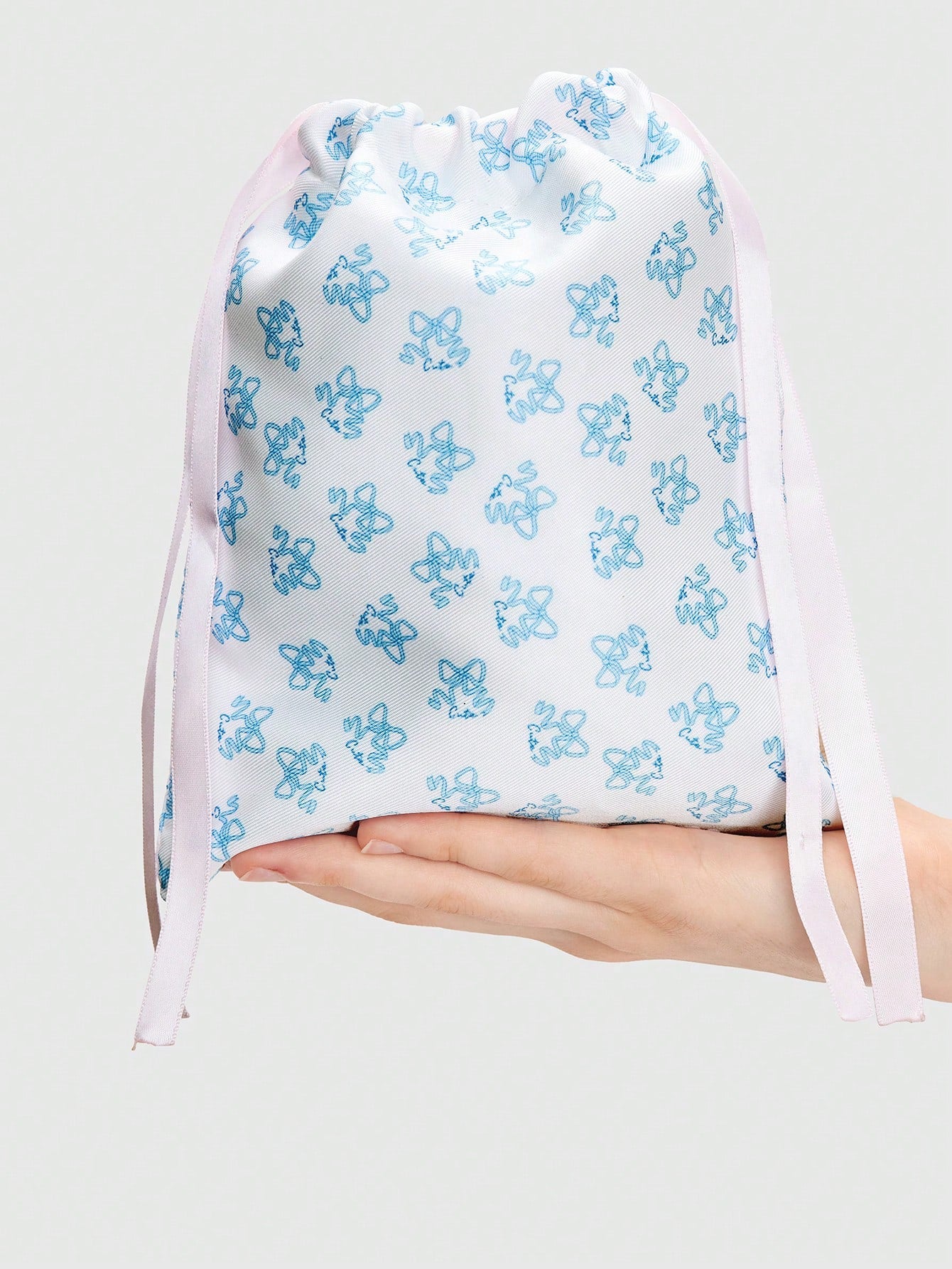 ROMWE Kawaii Bolsa de cosméticos portátil con cordón de lazo y estampado completo de moños, bolsa de almacenamiento