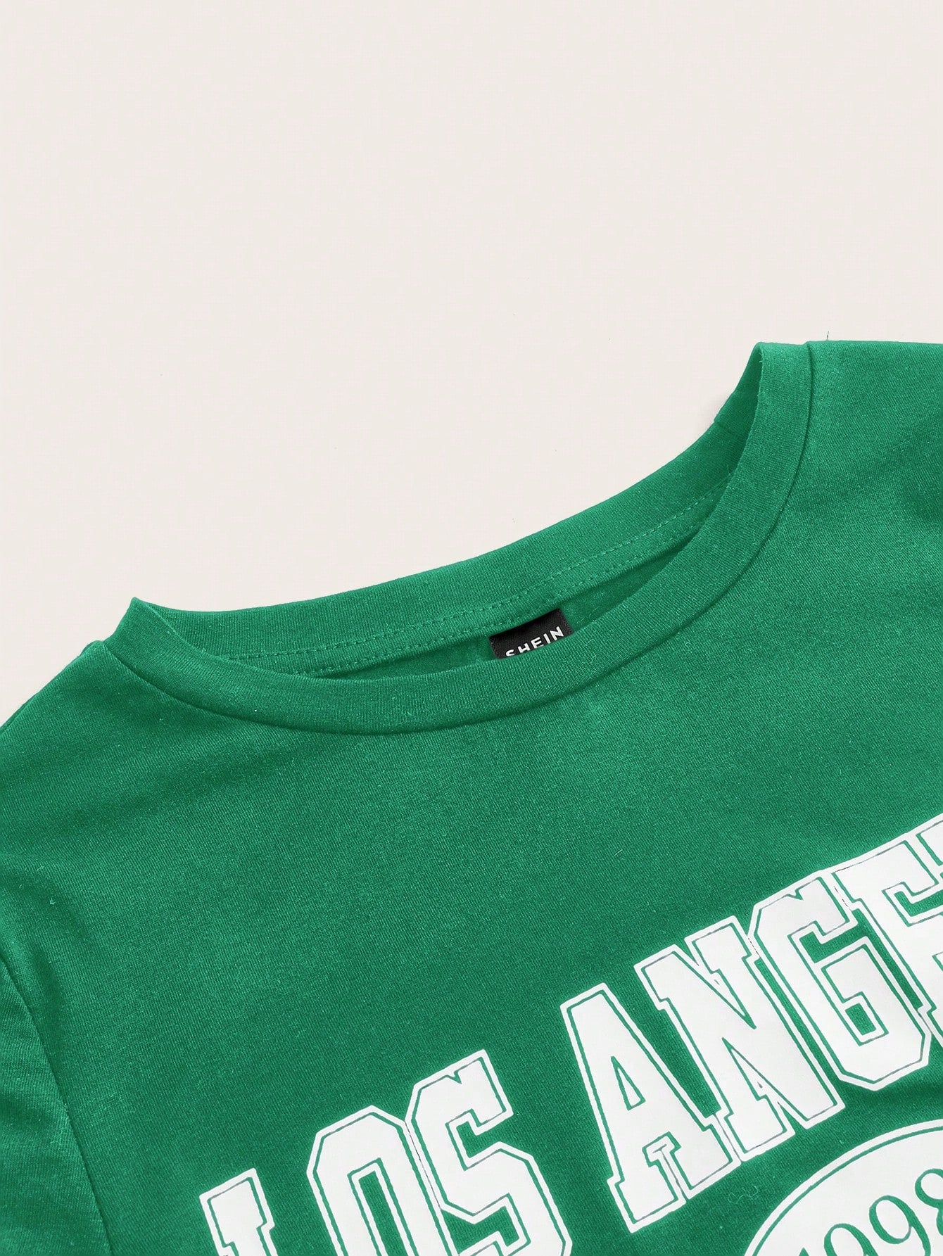 SHEIN EZwear Camiseta de mujer tejida con impresión de letras y estampado de goma