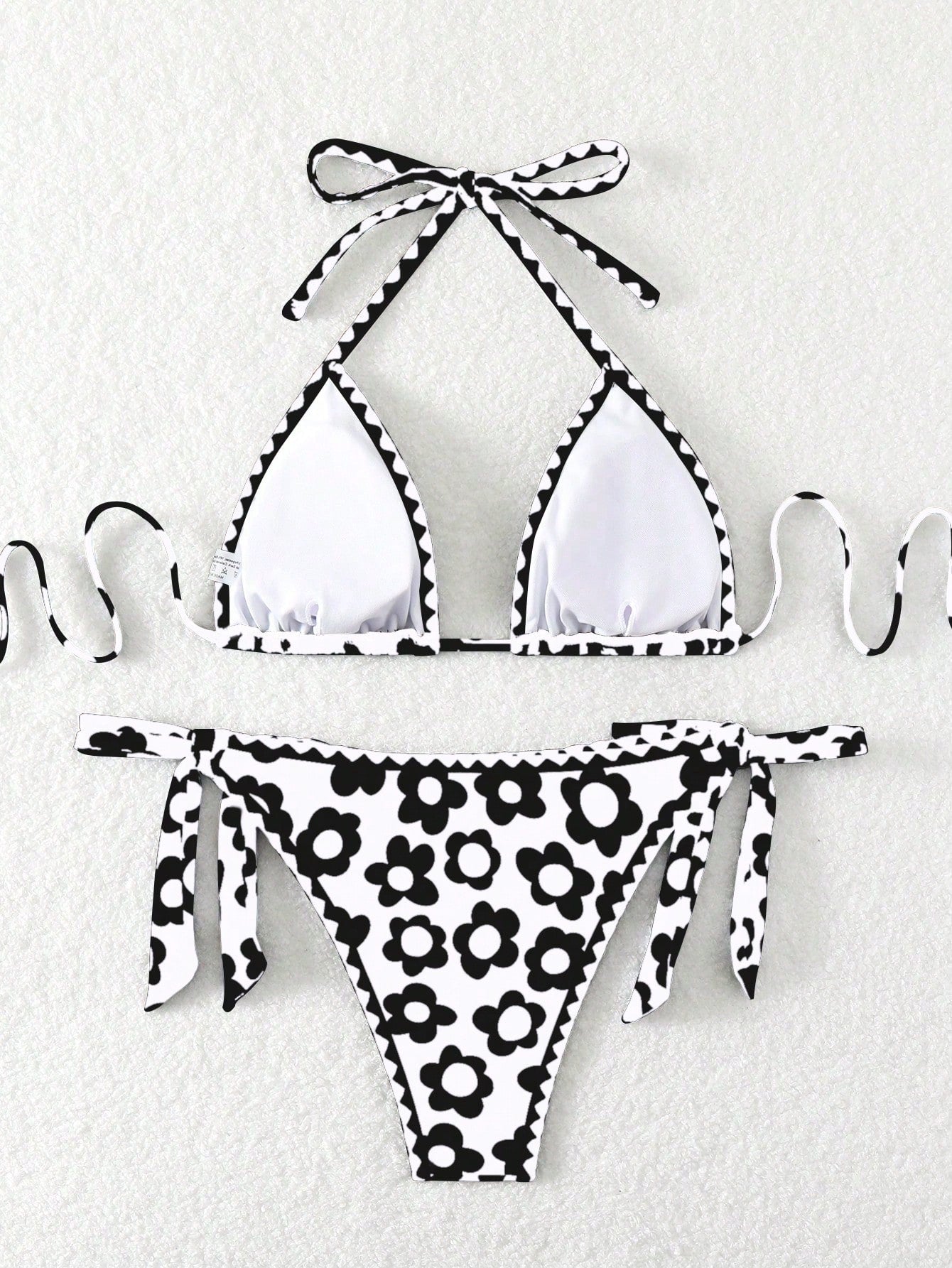 SHEIN Swim Conjunto de bikini para mujer, parte superior con escote halter y espalda descubierta, Bottom anudada a los lados con estampado floral para playa de verano