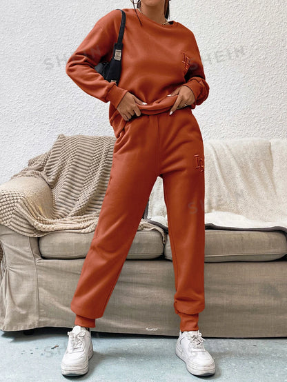 SHEIN EZwear Pantalones deportivos con sudadera con estampado de letra de hombros caídos