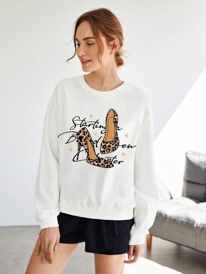 SHEIN Essnce Sudadera informal de mujer con ajuste holgado con estampado de dibujos animados, adecuada para otoño/invierno