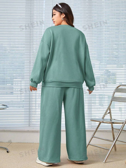SHEIN EZwear Conjunto De Sudadera De Cuello Redondo Y Pantalones Con Cordón A La Cintura Para Mujer De Talla Grande