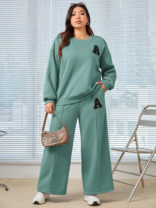 SHEIN EZwear Conjunto De Sudadera De Cuello Redondo Y Pantalones Con Cordón A La Cintura Para Mujer De Talla Grande