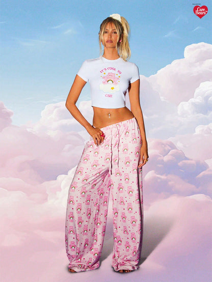 MISSGUIDED x Carebears MISSGUIDED Conjunto de pijama de dos piezas, ropa de dormir y estar en casa con gráfico de nube y arcoíris, camiseta de bebé y pantalones de pierna ancha, ropa de noche cómoda