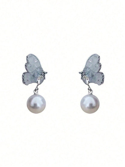 Un par de pendientes de círculo simple de plata rota con temperamento frío para niñas