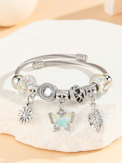 1 pieza Brazalete/pulsera de acero inoxidable con encantos de mariposa, hojas y flores con diamantes de imitación, para decoración diaria de niñas/mujeres