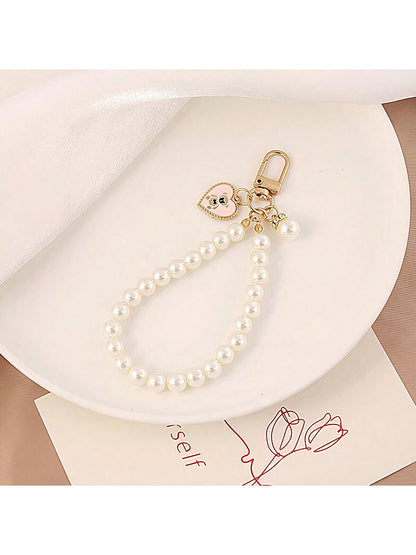 1 pieza Lindo y sencillo llavero con colgante de oso con corazón dorado y perla, anillo de llave de coche de moda, decoración para funda de bolso y auriculares, gran regalo para chicas, apropiado para uso diario