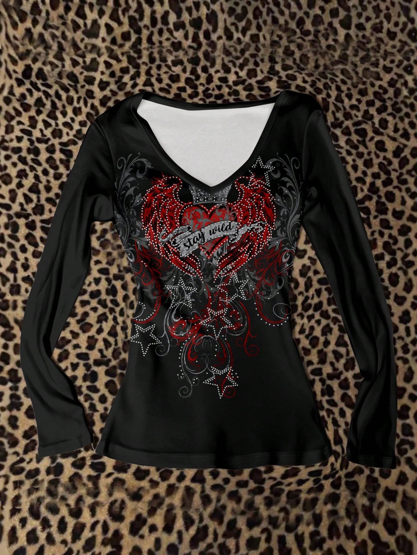 Attitoon Camiseta de manga larga con cuello en V casual y versátil con estampado de corazón y alas, adecuada para el aeropuerto en otoño/invierno