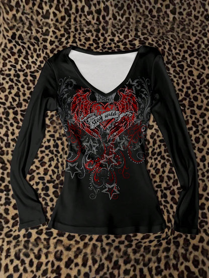 Attitoon Camiseta de manga larga con cuello en V casual y versátil con estampado de corazón y alas, adecuada para el aeropuerto en otoño/invierno