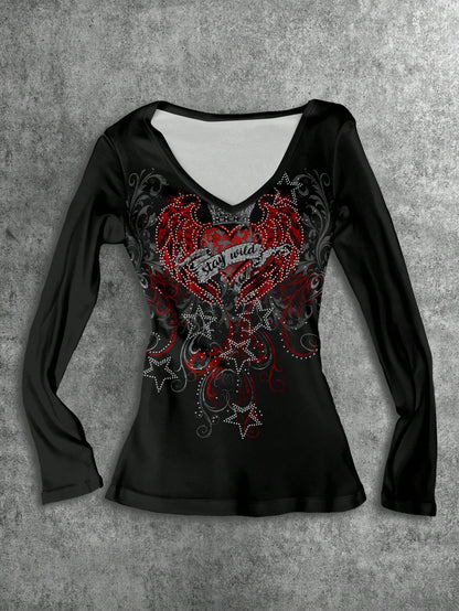 Attitoon Camiseta de manga larga con cuello en V casual y versátil con estampado de corazón y alas, adecuada para el aeropuerto en otoño/invierno