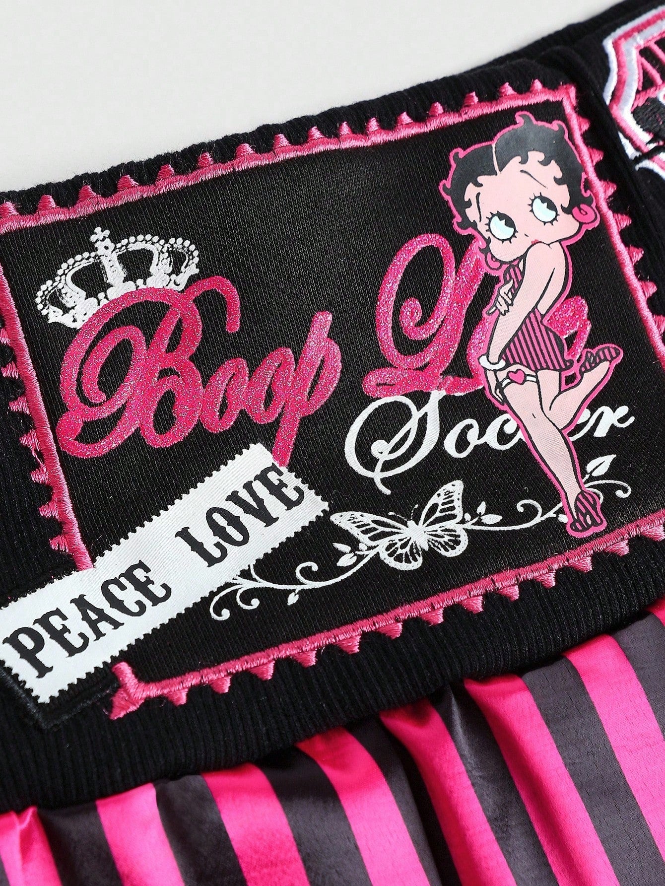Betty Boop | ROMWE Minifalda de mujer con estilo motero Betty de vanguardia con rayas de contraste