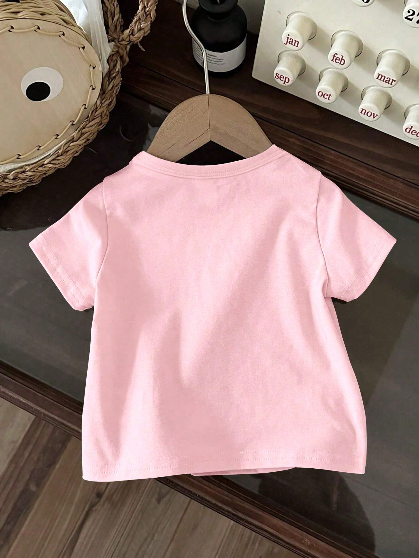 Camiseta casual cómoda de manga corta con estampado de letras y fantasmas para niña joven en verano