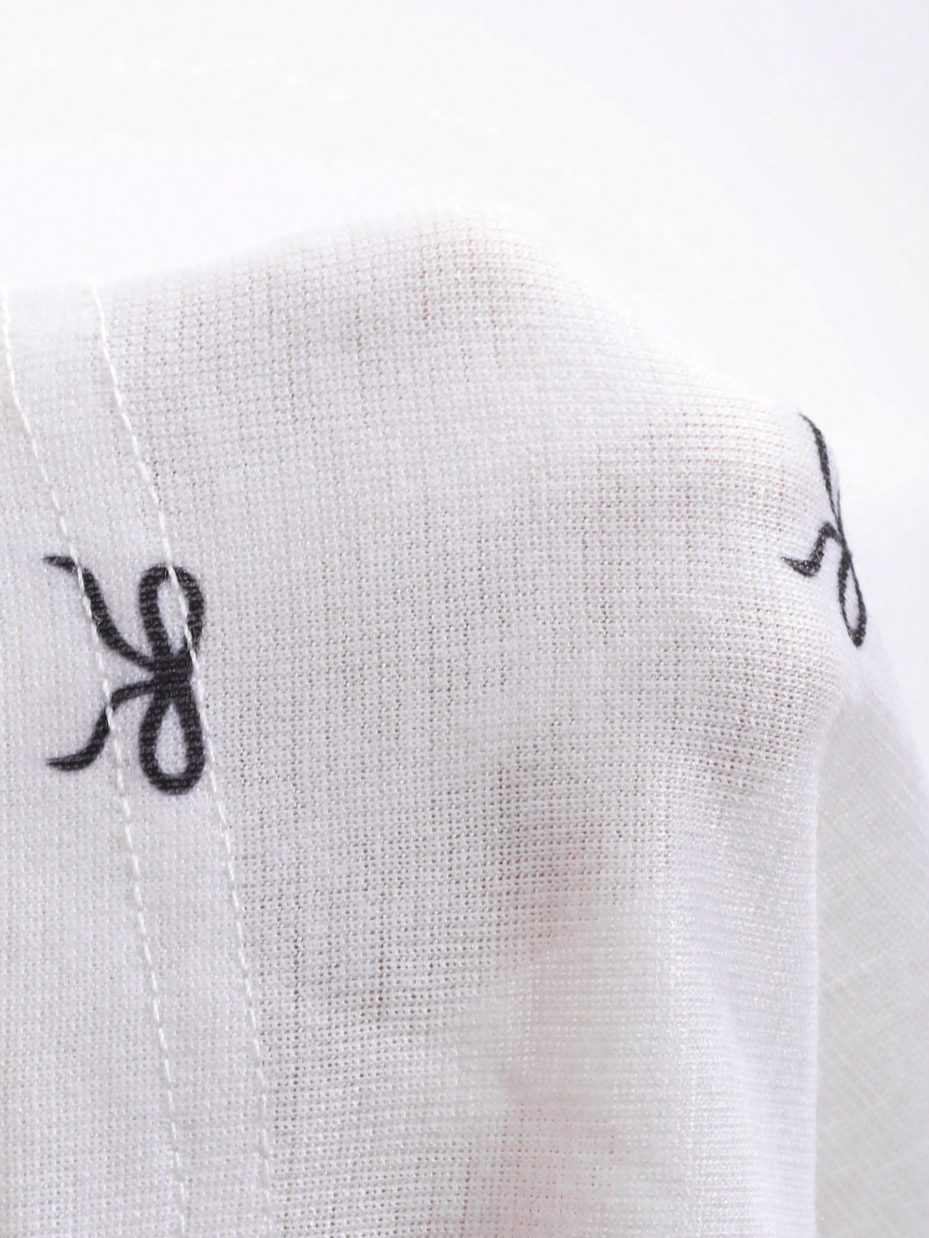 DAZY Camiseta de manga larga con cuello redondo y estampado de moño para mujer