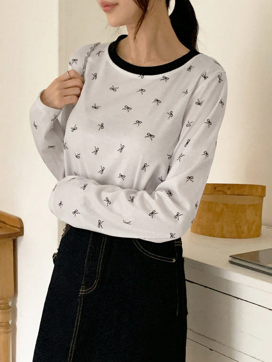 DAZY Camiseta de manga larga con cuello redondo y estampado de moño para mujer