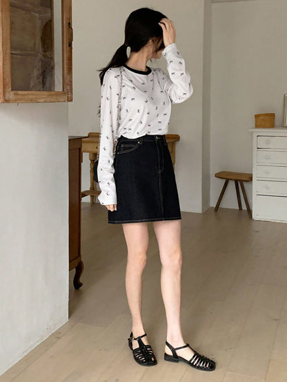 DAZY Camiseta de manga larga con cuello redondo y estampado de moño para mujer