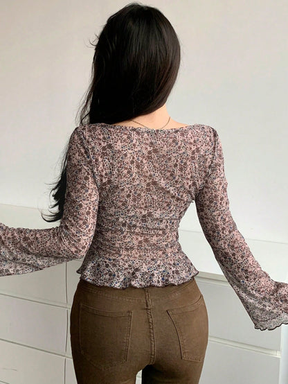 Dazy Designer Blusa de manga larga semitransparente con estampado floral y volantes para festival