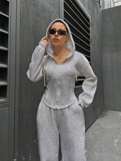 Flirla Conjunto casual de dos piezas para mujer, que incluye sudadera con capucha de manga larga con cremallera delantera y hombros caídos, y pantalones de unicolor