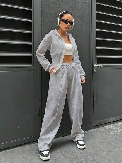 Flirla Conjunto casual de dos piezas para mujer, que incluye sudadera con capucha de manga larga con cremallera delantera y hombros caídos, y pantalones de unicolor