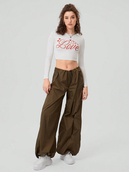 Forever 21 Top Largo Con Mangas Largas Recortadas E Impresión De Letras