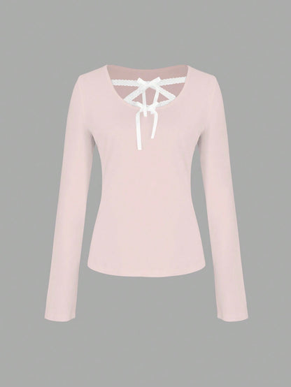 INAWLY Camiseta de manga larga ajustada para mujer con detalles de encaje y lazo en contraste