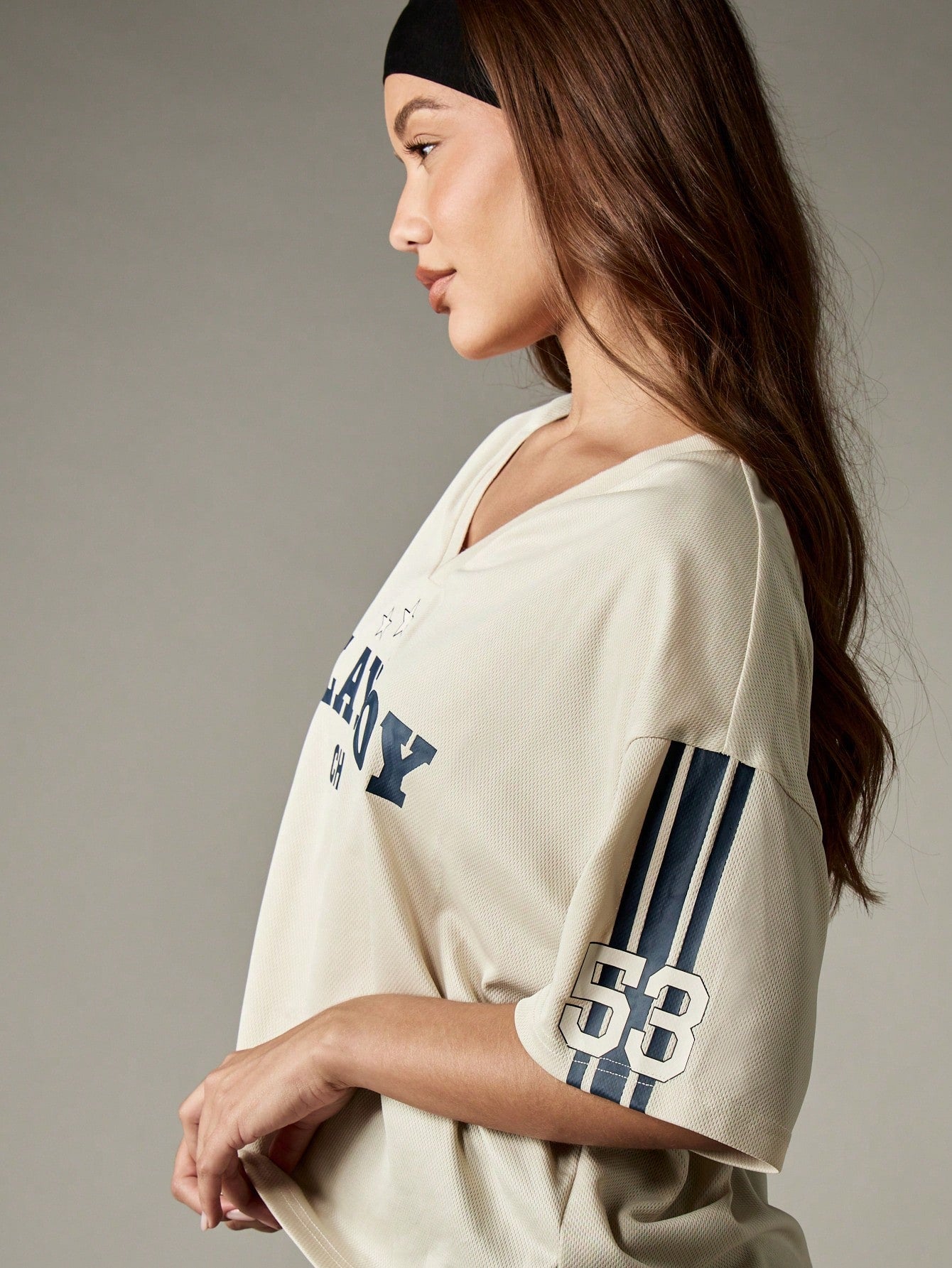 Missguided x Playboy Top corto con cuello en V oversize, estilo de fútbol, con estampado de estrellas universitarias en el pecho, para uso casual, de fin de semana y streetwear básico de otoño