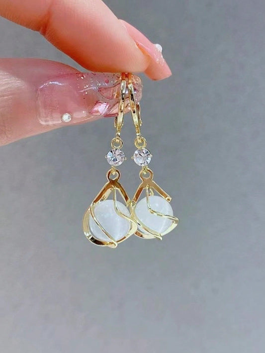 1 par de pendientes de moda clásicos europeos y americanos, pendientes de piedra de ojo de gato, pendientes largos con colgante de gota de diseño dulce