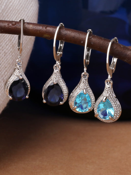 2 pares/set de aretes colgantes en forma de lágrima de resina azul y aretes redondos