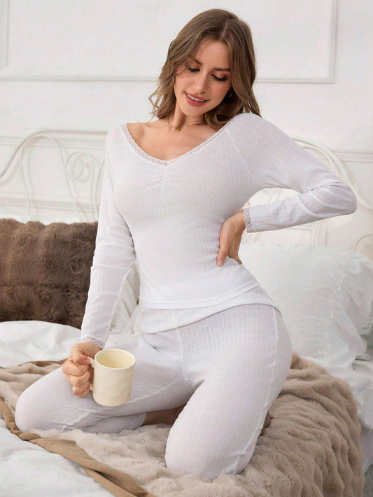 Conjunto de ropa de dormir para mujer con top de manga larga de cuello en V con parche de encaje y pantalones de unicolor