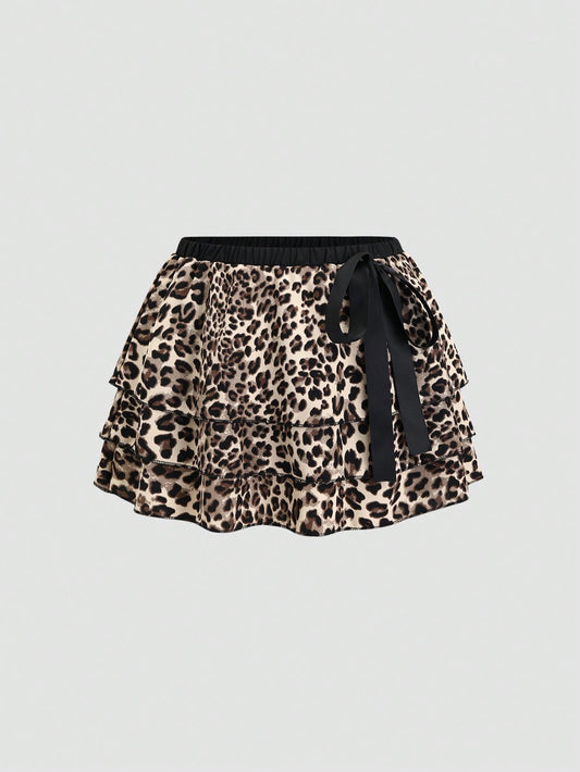 EgrlEra Falda en línea A con varios pliegues, de cintura baja, con estampado de leopardo, y un lazo decorativo en contraste de color negro para mujeres