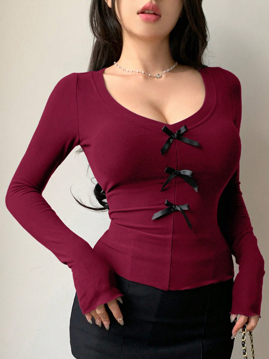 DAZY Camiseta ajustada de manga larga con cuello en V y decoración de lazo, primavera y otoño, para mujer