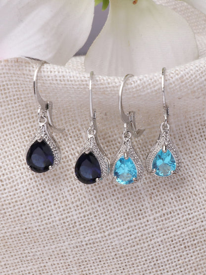 2 pares/set de aretes colgantes en forma de lágrima de resina azul y aretes redondos