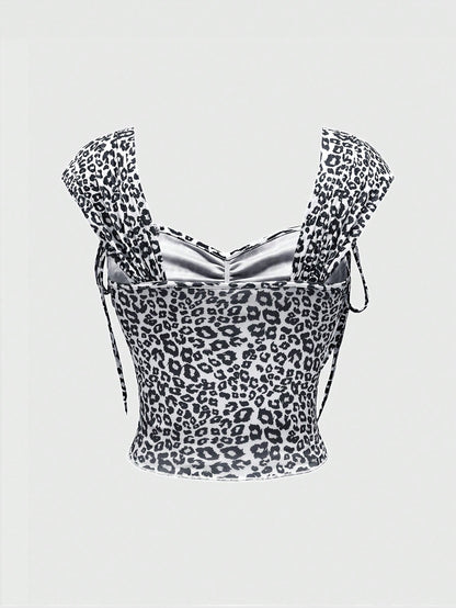 ROMWE J-Fashion Top de malla elástico ajustado con cuello de barco, lazo y estampado de leopardo sexy y de tendencia para mujeres maduras