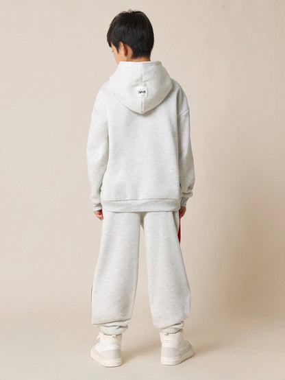 SUMWON Conjunto de 2 piezas para niños preadolescentes, con sudadera con capucha estampada de Nueva York de ajuste regular y cómoda, y pantalón jogger de ajuste recto con paneles contrastantes