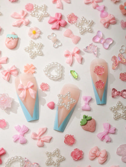 100 piezas 3D Mariposas de resina rosa, osos, flores de rosa, falda de durazno, lazo, ciervos, serpientes, conejos, animales en forma de arte de uñas, con estrás y perlas falsas para hacer decoración de arte de uñas y manualidades.