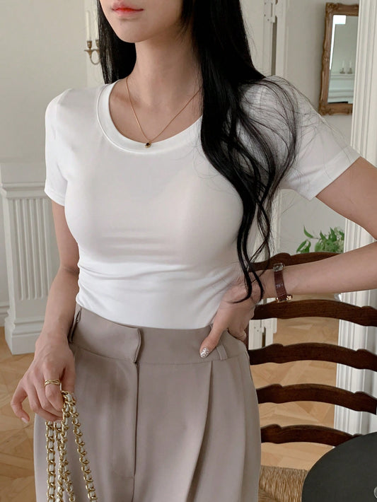 Camiseta casual de cuello redondo de manga corta y unicolor para mujer