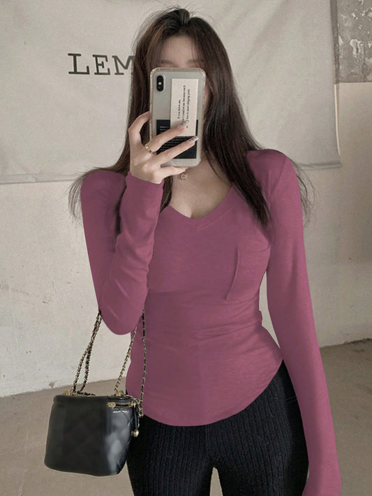 DAZY Camiseta ajustada de manga larga de cuello en V de unicolor con bolsillo para mujer, primavera y verano