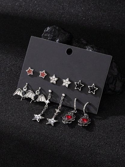 Juego de 6 pares de pendientes con colgantes de diseños góticos oscuros de moda, incluidos estrella, murciélago, corazón con rosa, guitarra, llave, estrella de mar, cuervo y calavera