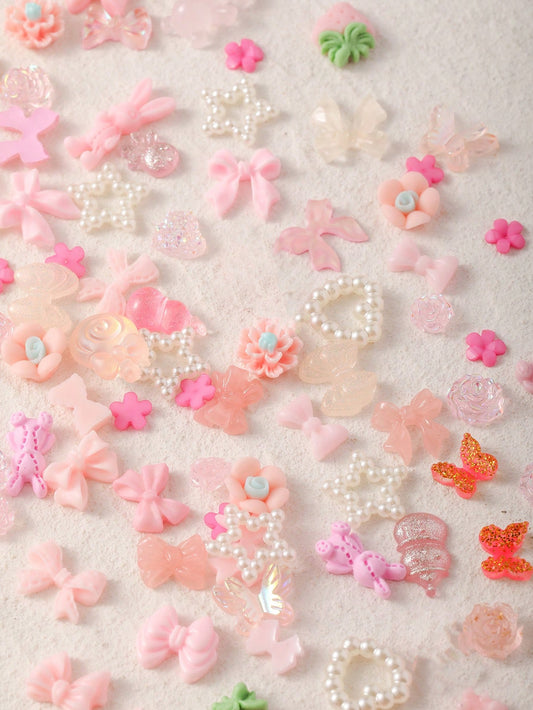 100 piezas 3D Mariposas de resina rosa, osos, flores de rosa, falda de durazno, lazo, ciervos, serpientes, conejos, animales en forma de arte de uñas, con estrás y perlas falsas para hacer decoración de arte de uñas y manualidades.