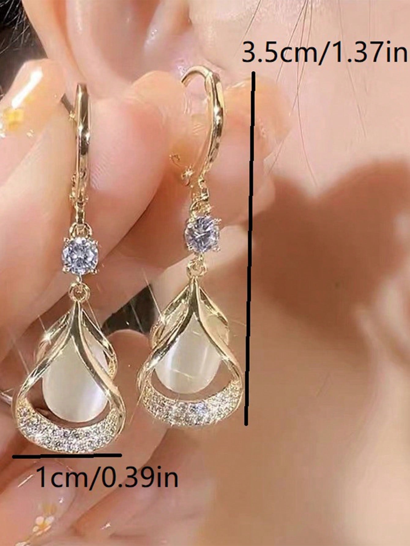 1 par de pendientes geométricos de lágrima de ojo de gato de piedra de alta gama, pendientes de lágrima elegantes y estilizados de lujo de nicho para mujeres