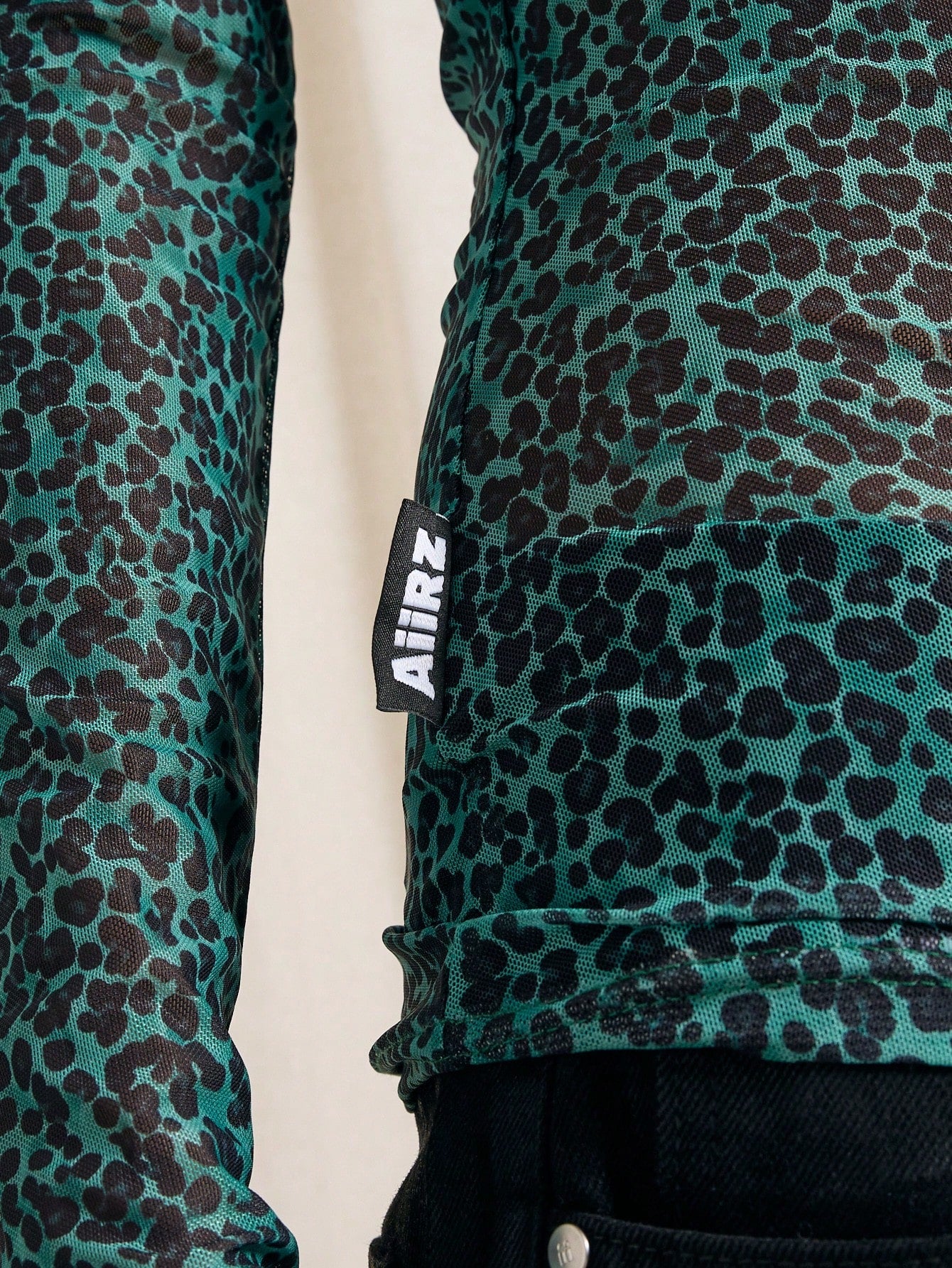 AiiRZ Blusa de manga larga, cuello redondo y estampado de leopardo translúcida