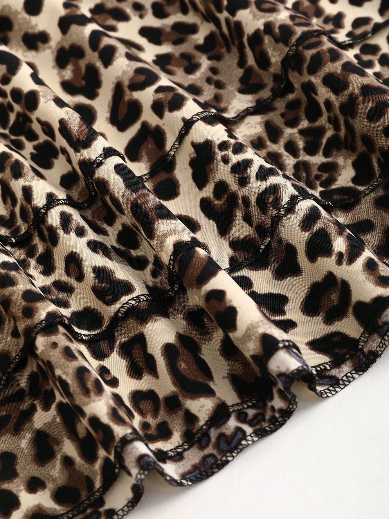 EgrlEra Falda en línea A con varios pliegues, de cintura baja, con estampado de leopardo, y un lazo decorativo en contraste de color negro para mujeres