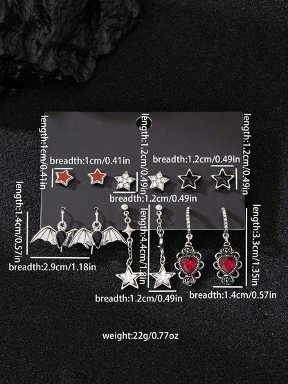 Juego de 6 pares de pendientes con colgantes de diseños góticos oscuros de moda, incluidos estrella, murciélago, corazón con rosa, guitarra, llave, estrella de mar, cuervo y calavera